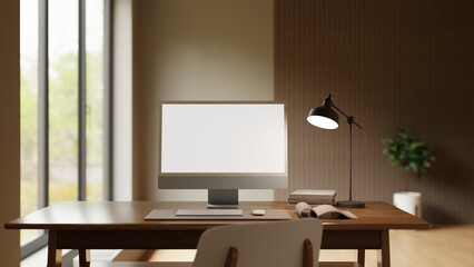 Minimalist workspace with desktop computer, desk lamp, and books on a wooden table