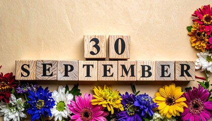 Wooden Blocks with Date 30 September. Floral Calendar – Vibrant Flowers on Solid Colored Background