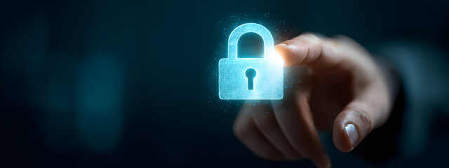 Business hand touching a holographic padlock for secre digital access