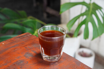 Arabica V60, captured on September 2, 2025. Hand-brewed Arabica coffee using V60 pour-over method, hot black coffee in glass server and ceramic cup, minimalist modern café style lifestyle photography