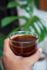 Arabica V60, captured on September 2, 2025. Hand-brewed Arabica coffee using V60 pour-over method, hot black coffee in glass server and ceramic cup, minimalist modern café style lifestyle photography