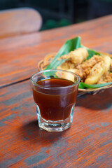 Arabica V60, captured on September 2, 2025. Hand-brewed Arabica coffee using V60 pour-over method, hot black coffee in glass server and ceramic cup, minimalist modern café style lifestyle photography