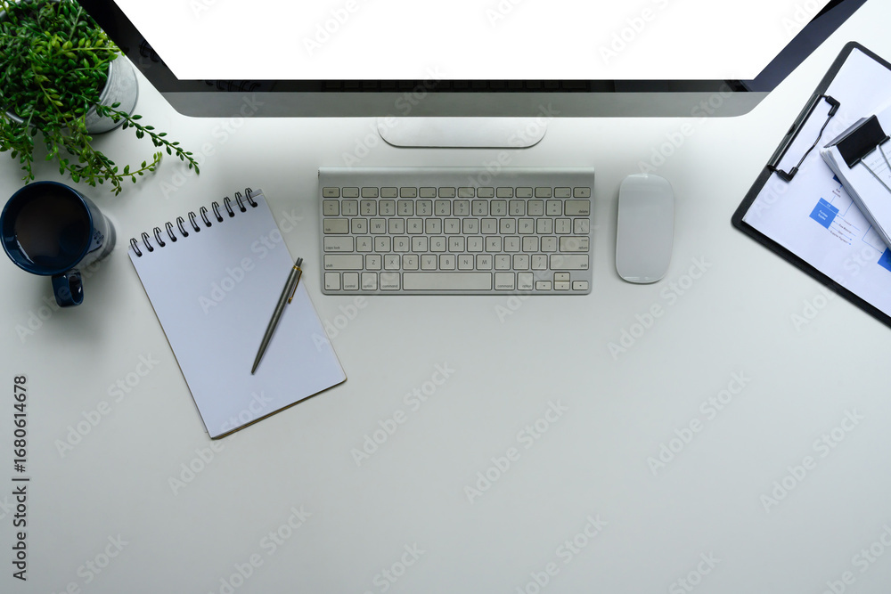 Poster overhead view of computer accessories and financial charts for productivity concept