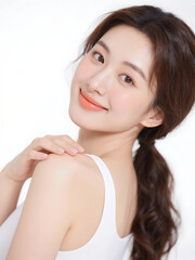 Naklejka premium Portrait of a happy young woman with flawless complexion and natural makeup, showcasing healthy skin. Beauty and cosmetology concept on a white background