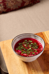 A Delicious and Vibrant Bowl of Hearty Soup, Beautifully Garnished with Fresh and Flavorful Herbs