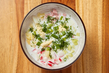 Enjoy a Delicious and Creamy Salad made with Fresh Vegetables and Flavorful Herbs