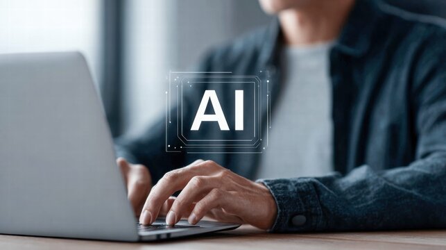 Person working on a laptop with AI overlay, symbolizing technology and innovation.
