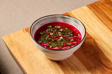 Delicious and Vibrant Beetroot Soup, enhanced with Fresh, Green Herbs for ultimate flavor