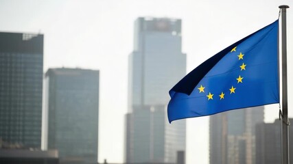 European Union flag waving against urban skyline. Official European Union flag flutters on flagpole, symbolizing union of member states in Europe. European Union flag represents unity of purpose. - Powered by Adobe