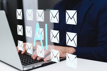 Cropped image of businessman typing on laptop at workplace in office.