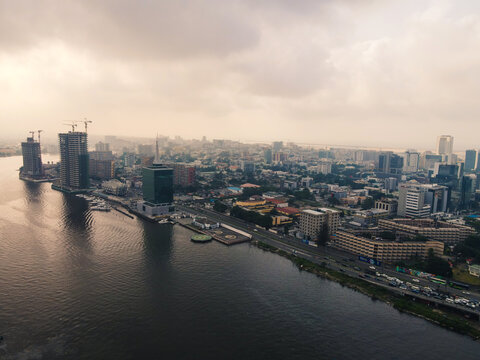 Aerial view of the striking contrast between the dark waters and the emerging skyscrapers along Ozumba Mbadiwe Avenue, Lagos, Lagos, Nigeria.