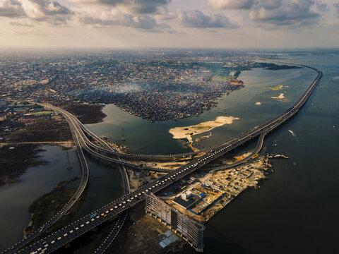 Aerial view of the expansive Third Mainland Bridge stretching across the lagoon, connecting Lagos Island with the mainland, Lagos, Lagos, Nigeria.