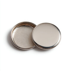 Blank round metal container, shiny and clean, offering potential for elegant design