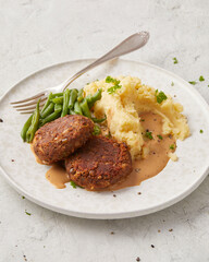 Lentil patties with mashed potatoes