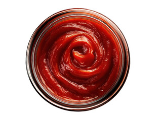 Close up view of a glass bowl filled with smooth and glossy red tomato ketchup sauce swirl