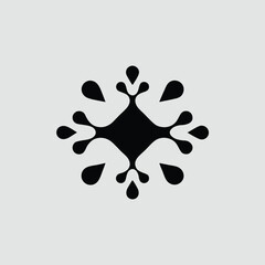 Black ink splatter design element on a plain gray background