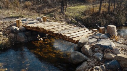 Obraz premium Rustic wooden bridge over a stream