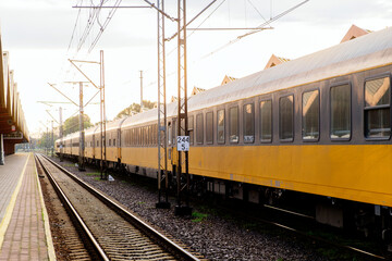 A close-up of the train's wagons, highlighting its impressive size and speed. This image captures...