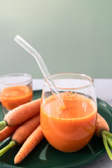 Glass of fresh carrot juice