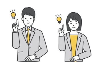 笑顔でポーズをとる男女ビジネスパーソン