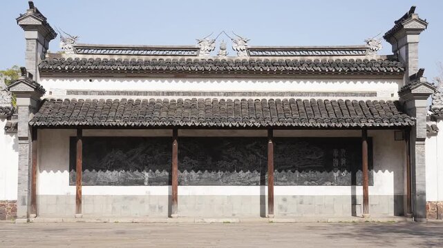 Traditional Jiangnan residential building with brick-tile roof and horse-head gable walls