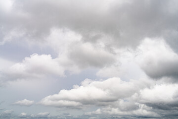 Dramatic overcast sky with gray and white clouds before rainy season storm, moody and gloomy...