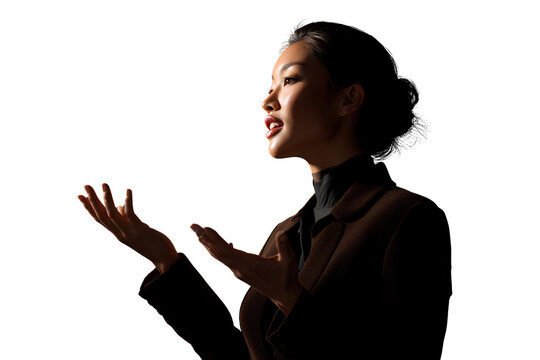 Biracial Asian Businesswoman Gesturing While Speaking, Mid-Shot, Isolated on Transparent Background - Powered by Adobe