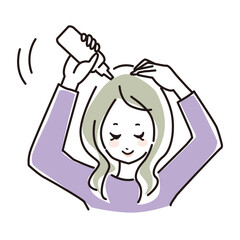 頭皮にローションをつけている若い女性の上半身