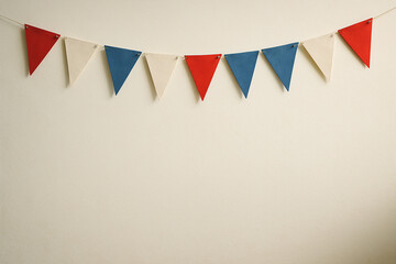 Obraz premium Party Bunting Garland on Neutral Wall Red Blue White