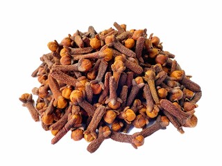 A pile of fresh dried brown cloves isolated on white background. Spice cloves. Close up of dried aromatic clove flower buds.