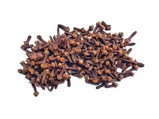 A pile of fresh dried brown cloves isolated on white background. Spice cloves. Close up of dried aromatic clove flower buds.