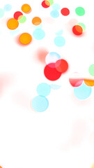Colorful shiny glowing bokeh light overlay effect on transparent background design element