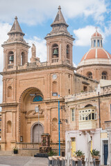 Fototapeta premium Churchyard and Parish Church of Our Lady of Pompei with towers and dome, Marsaxlokk MALTA