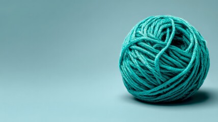 Turquoise yarn ball on smooth surface. Artificial intelligence image