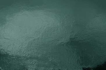 Green textured background creating dynamic visual interest