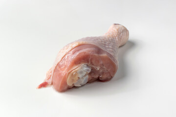 Raw chicken leg isolated on a white background. Raw chicken meat