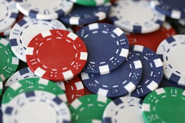 Poker Table With Poker Chips Turns In Casino. Many Poker Chips Spins on the Table