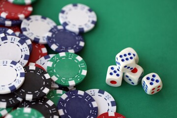 Dice game on the poker table in the casino. A successful combination of dice brought a lot of...