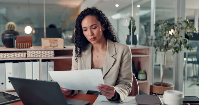 Documents, typing and laptop with business woman in office for tax filing, night and budget report. Accounting audit, payroll paperwork and financial review with person for submission deadline