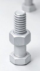 A close-up view of a polished metallic bolt and nut, showcasing intricate threading and a bright, neutral tone.