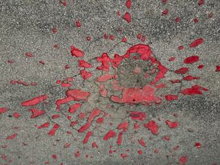 Sarajevo Rose - Memorial scar in Sarajevo marking the impact of a mortar shell explosion