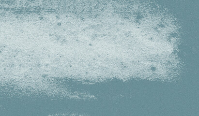 The old weathered aquamarine wall surface