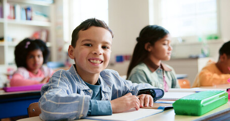 Smile, writing and portrait of child in classroom with confidence for education, learning or...