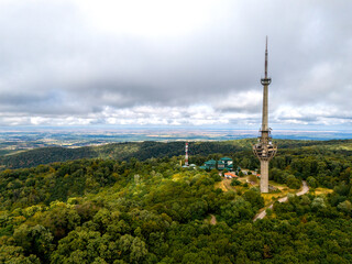 Destroyed TV Tower Rising Above the Forest Canopy