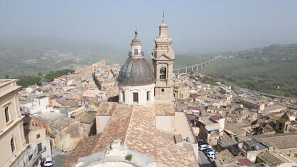 Caltagirone, the ceramic capital of Sicily. Famous for its monumental Staircase of Santa Maria del Monte, where centuries of tradition are painted step by step in colorful majolica tiles.