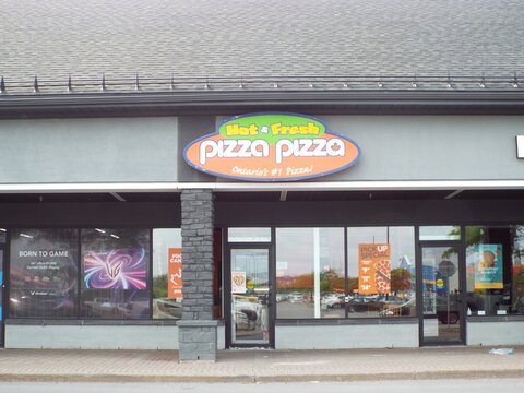 Kanata, ON, Canada, June 15, 2025: The storefront of a "Pizza Pizza" restaurant at 300 Earl Grey Dr Unit 6A.
