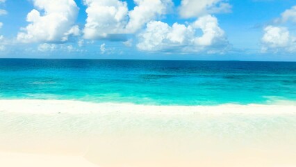 tropical beach with blue sky