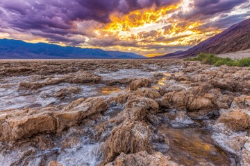 Dramatic sunset over a salt flat landscape
