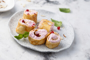 Pancakes with berries and cream cheese