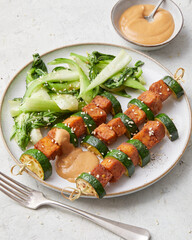 Tempeh skewers with peanut sauce
